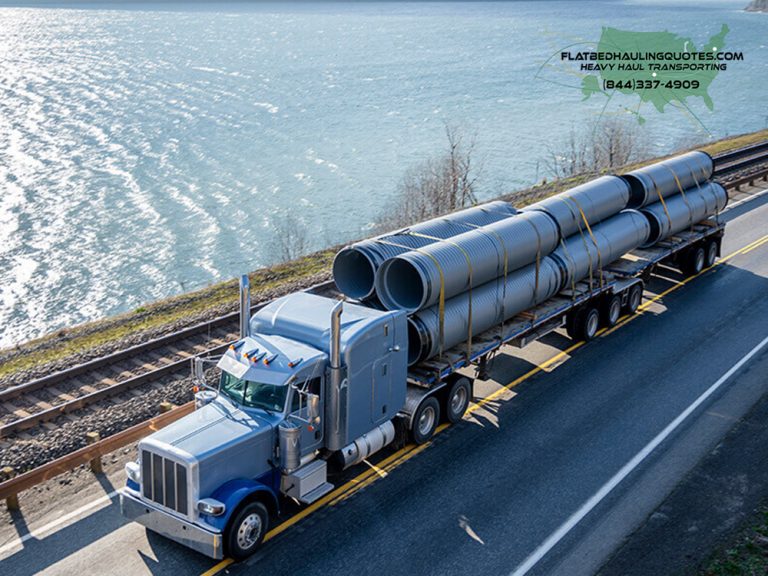 MOVING GOVERNMENT EQUIPMENT SHIPPING ON A FLATBED TRAILER